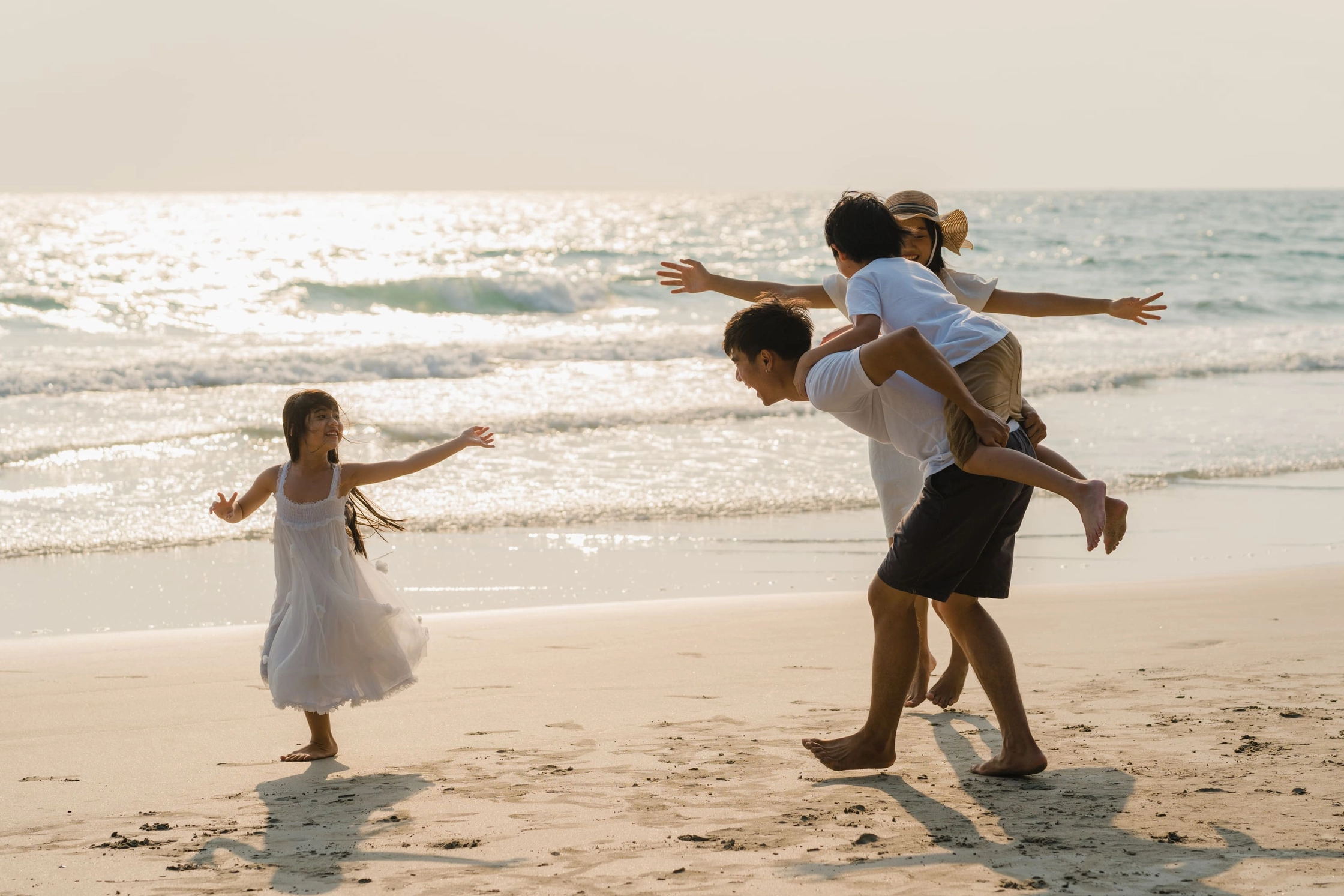 asian-young-happy-family-enjoy-vacation-beach-evening-dad-mom-kid-relax-playing-together-near-sea-when-sunset-while-travel-holiday-lifestyle-travel-holiday-vacation-summer-concept (1) (1)