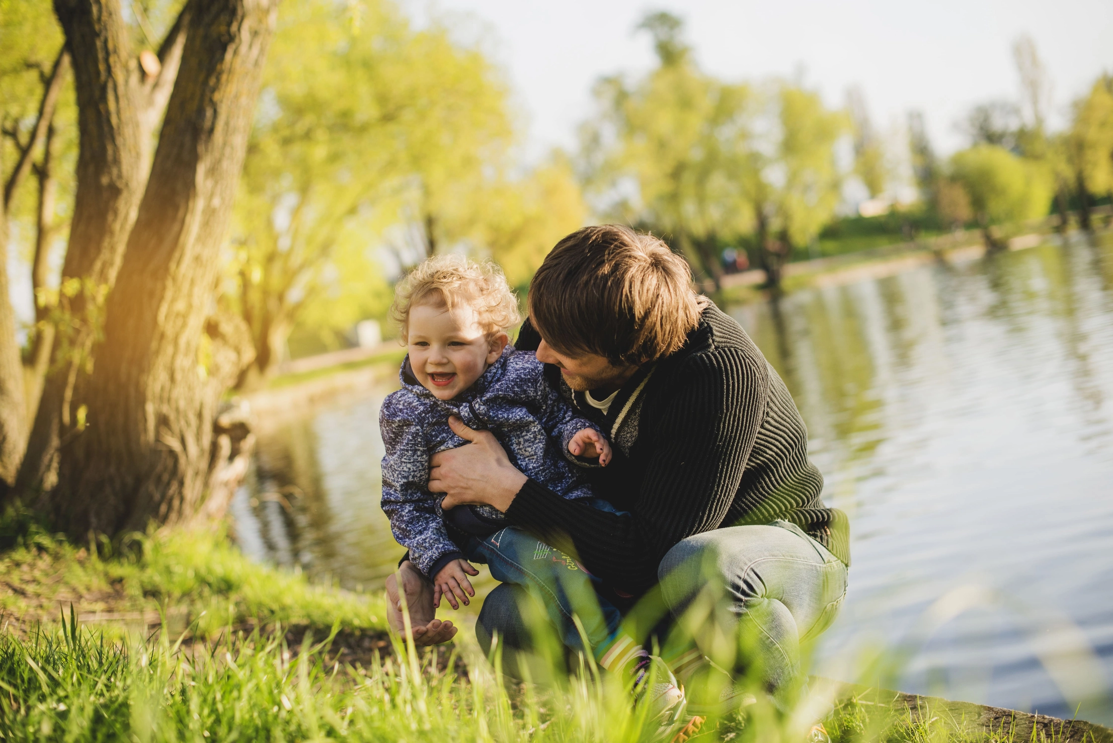 cheerful-child-having-fun-with-his-father