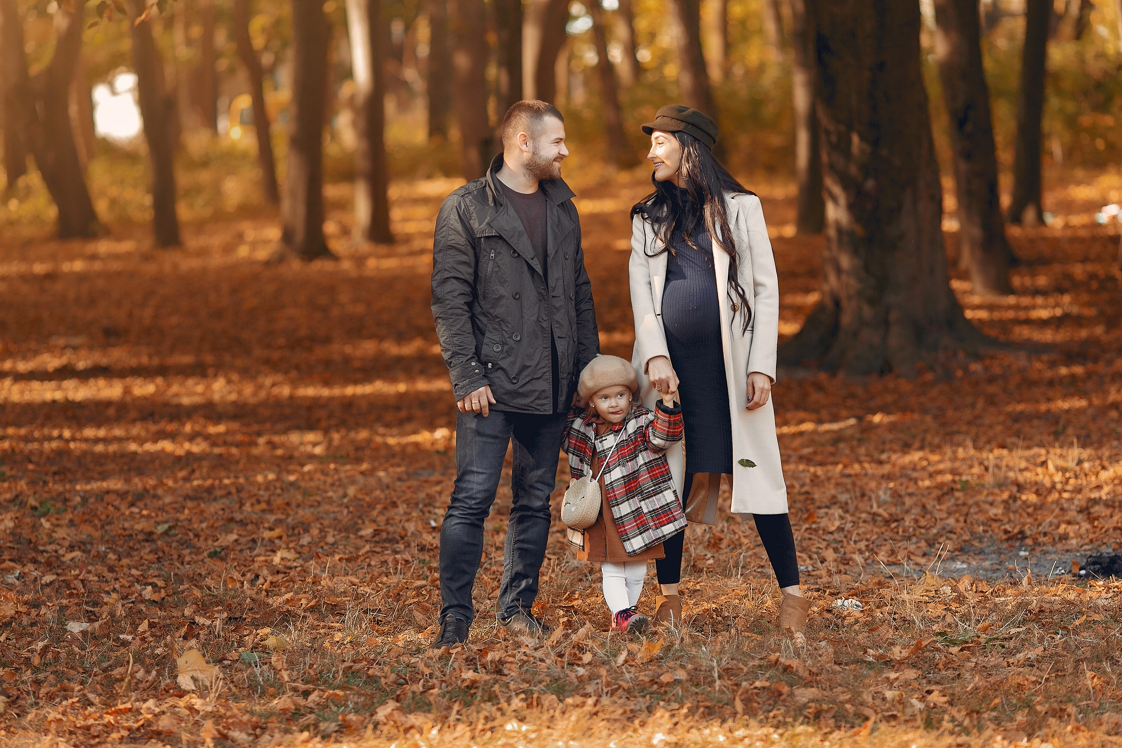 family-with-little-daughter-autumn-park