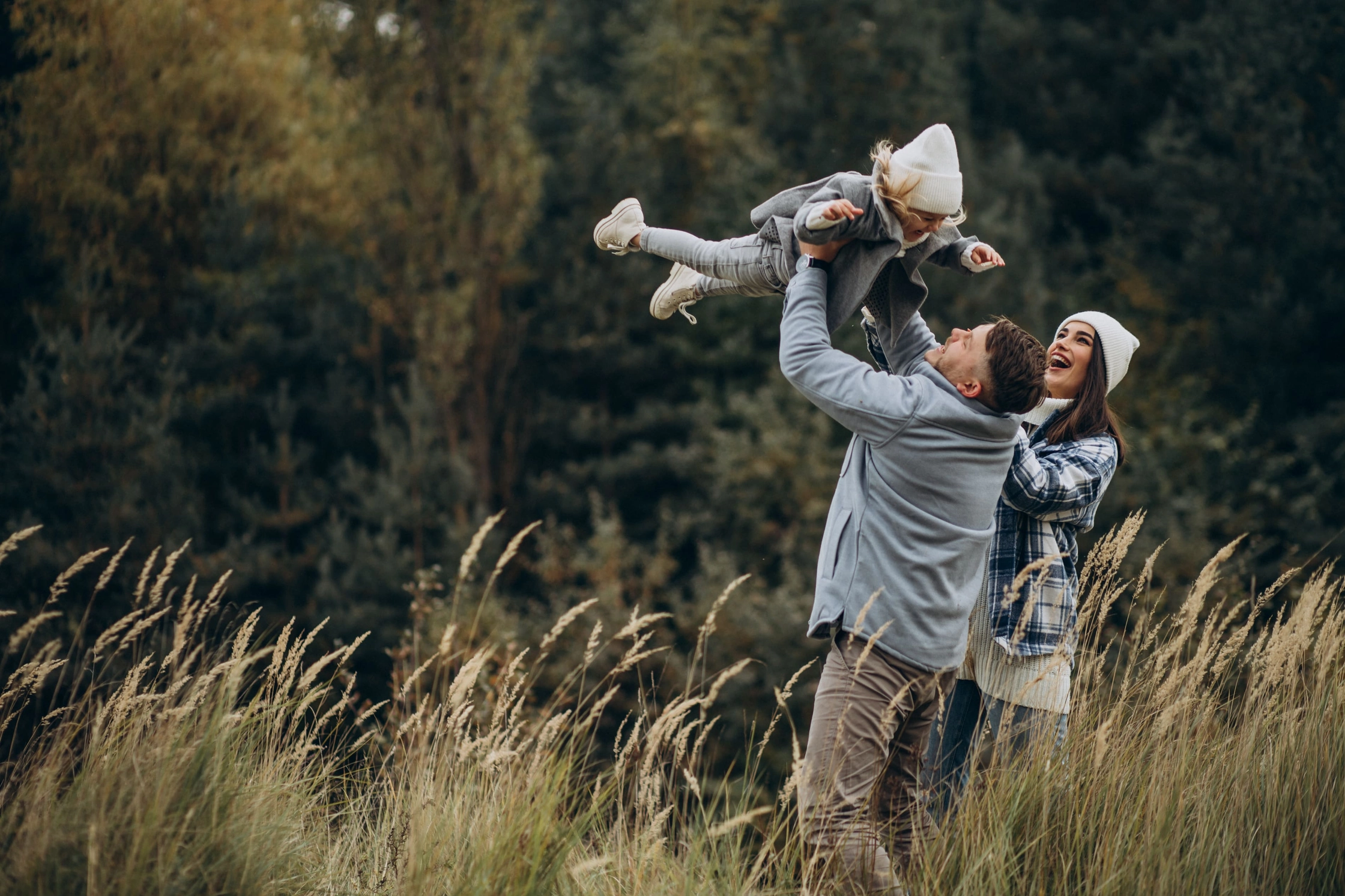 family-with-little-daughter-together-autumnal-weather-having-fun (1)