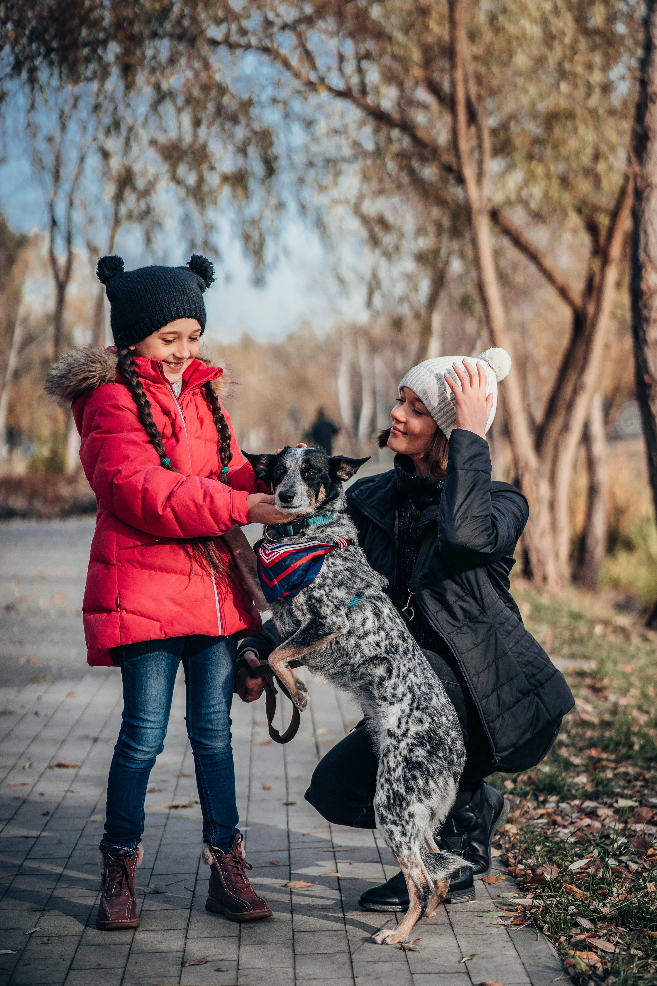 happy-mother-her-daughter-walk-with-dog-autumn-park