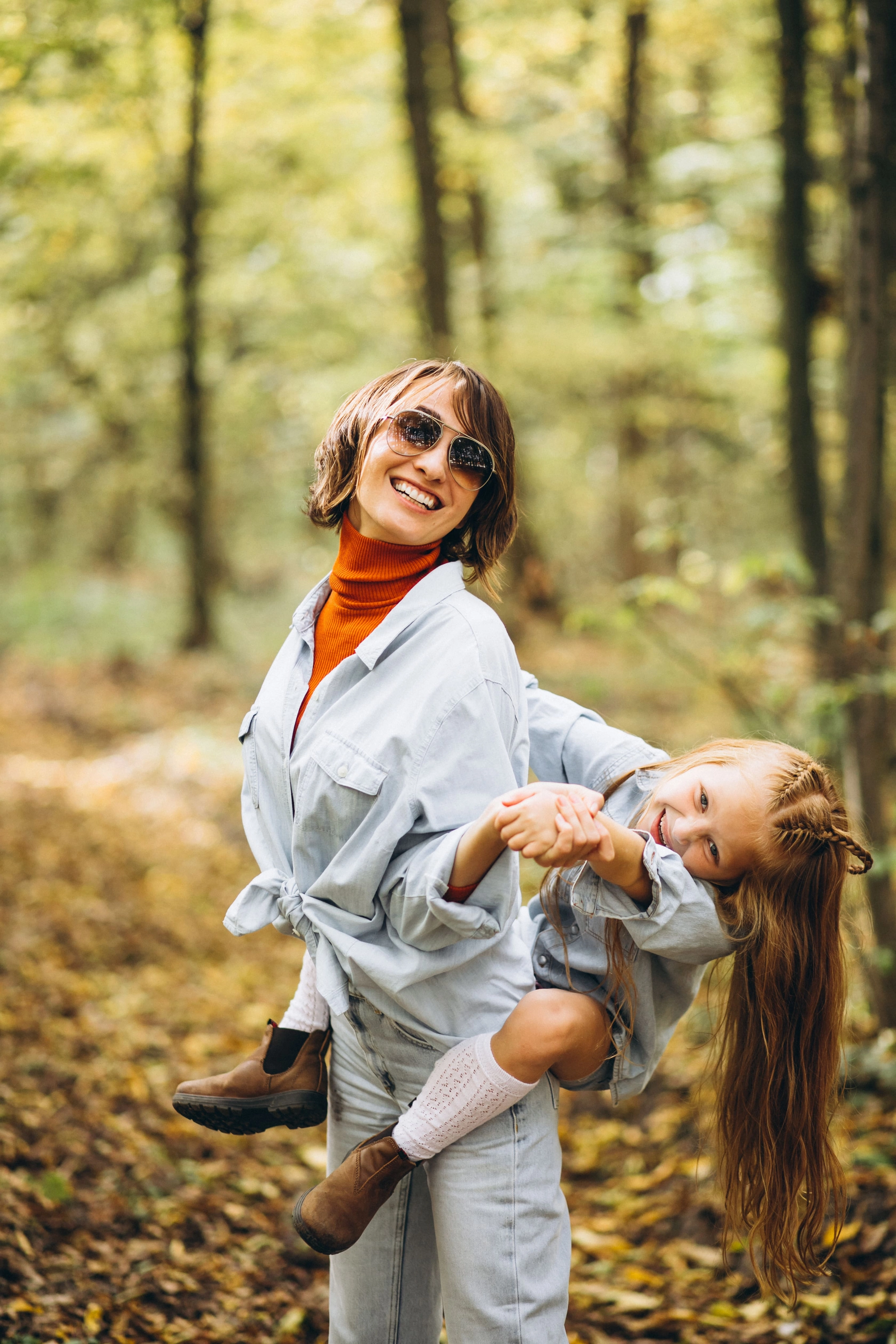 mother-with-her-little-daughter-forest-full-golden-leaves