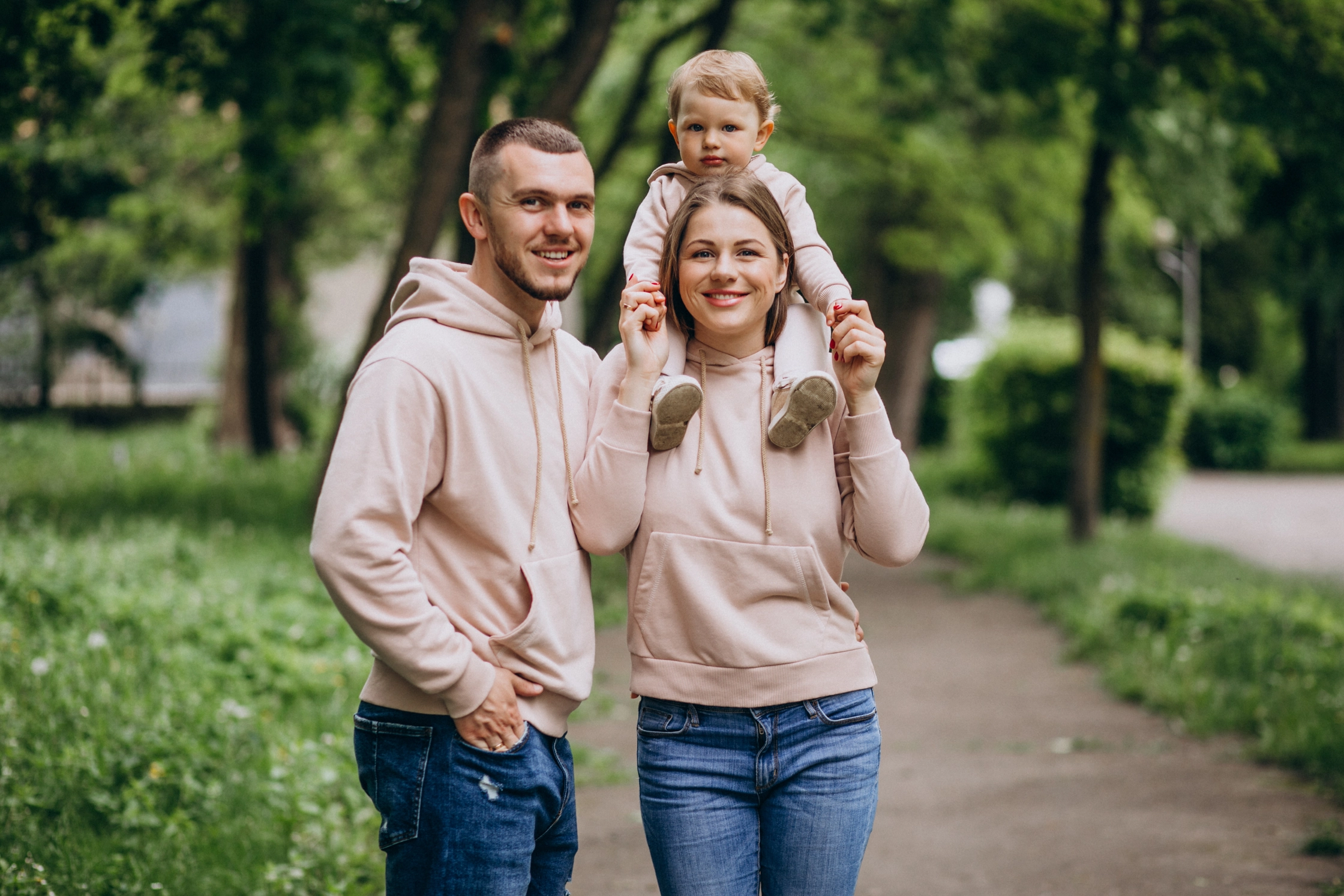 young-family-with-their-little-baby-child-park